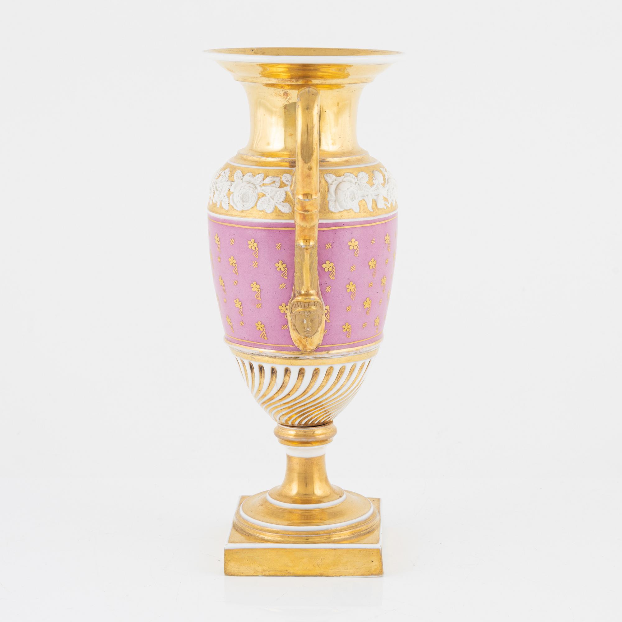 A gilt Empire porcelain vase, 19th Century.