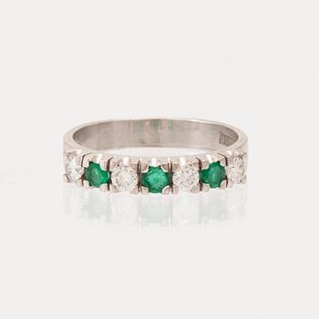 Ring half-eternity 18K white gold with round faceted emeralds and diamonds, Heribert Engelbert Stockholm 1981.