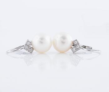 A pair of cultured pearl and ca 1.10 cts brilliant cut diamond earrings.