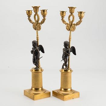 A pair of Empire candelabras.