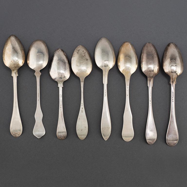 Nineteen 18th, 19th and 20th  Century silver table spoons.