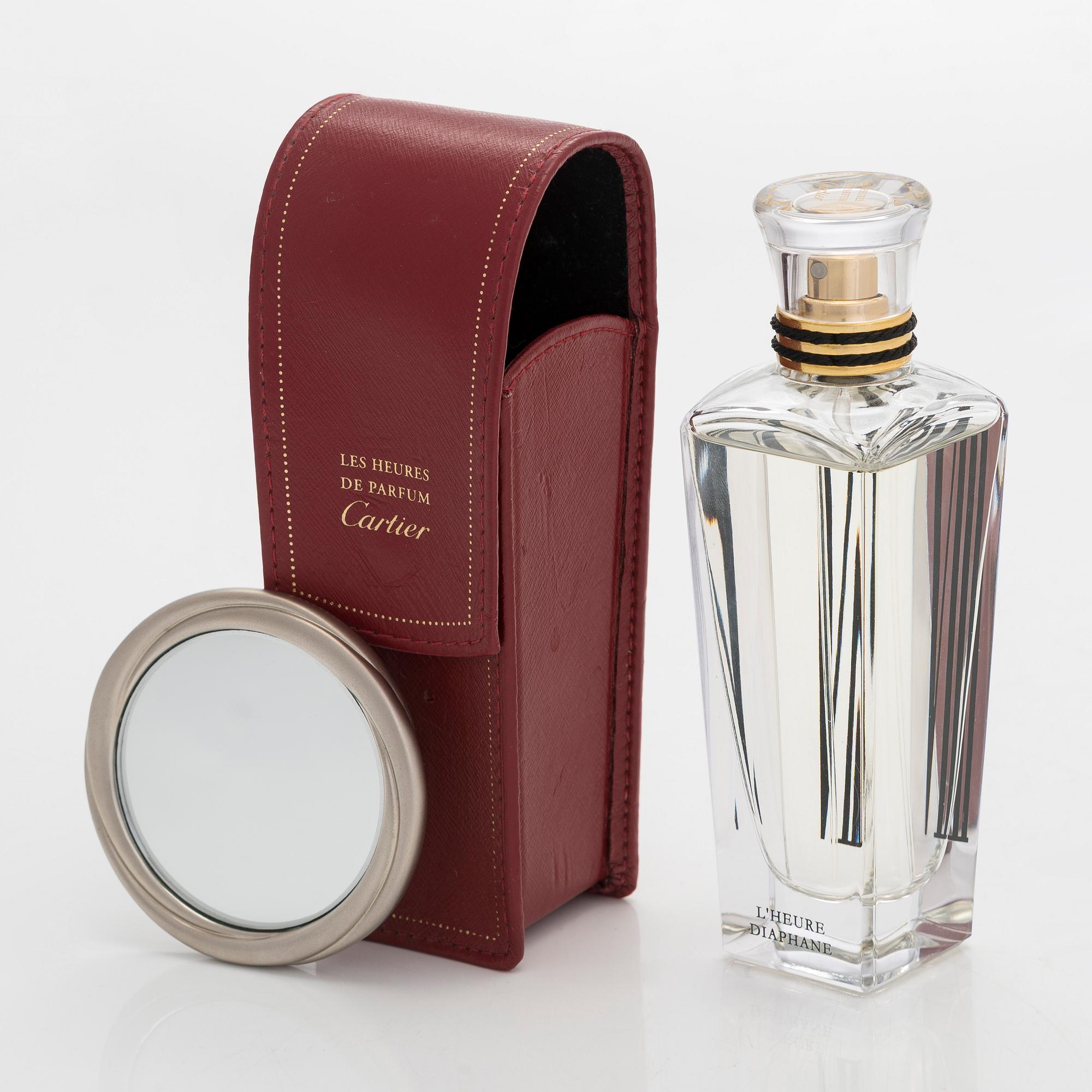 Cartier, parfymfodral med parfymflaska och sminkspegel.