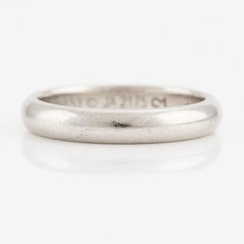 A Cartier platinum ring.
