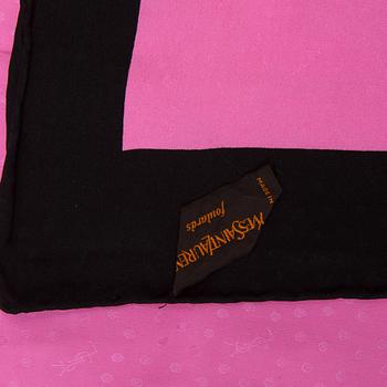 A silk scarf by Yves Saint Laurent.