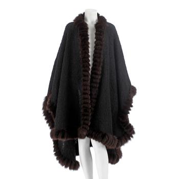 588. YVES SAINT LAURENT, a black wool and brown fur trimmed cape.