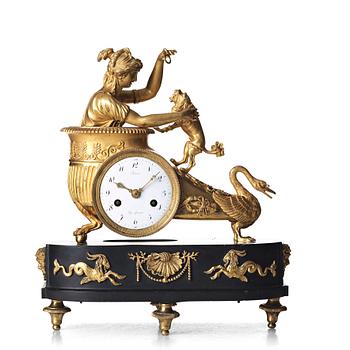 141. A French Empire early 19th century mantel clock.