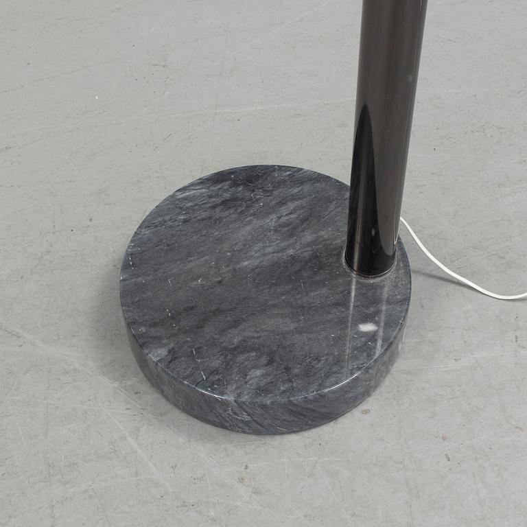 A floorlamp on marble-foot, the end  of the 20th century.