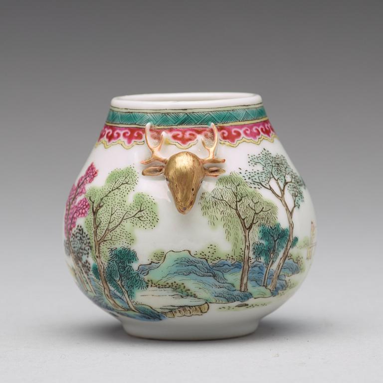 A famille rose miniature vase, Republic (1912-49)with Qianlongs mark to the base.