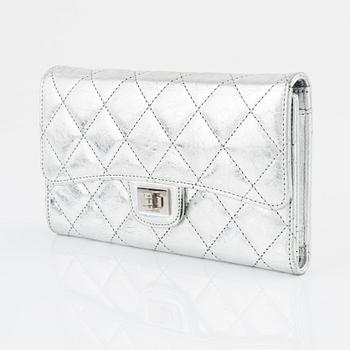Chanel, a quilted silver leather wallet, 2006-08.