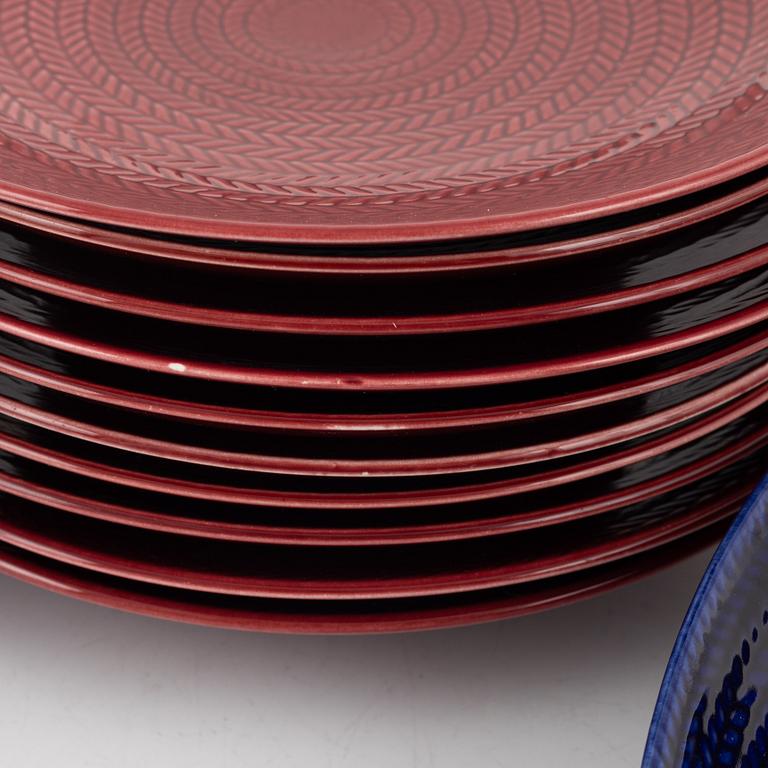 Hertha Bengtson, a set of 18 bowls and plates, 'Blå Eld', Rörstrand, Sweden.