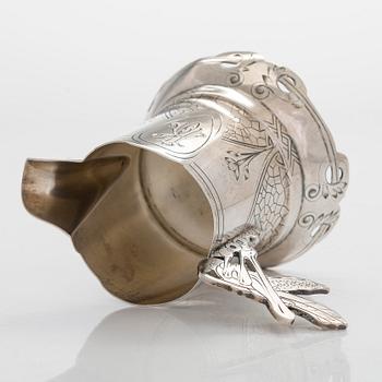 A silver cream jug, maker's mark Pavel Amerikantsev, Moscow 1908-26.