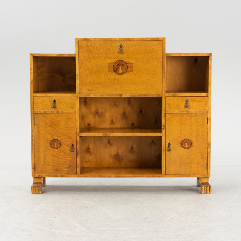 A 1930's birch veneered bookcase/sideboard.