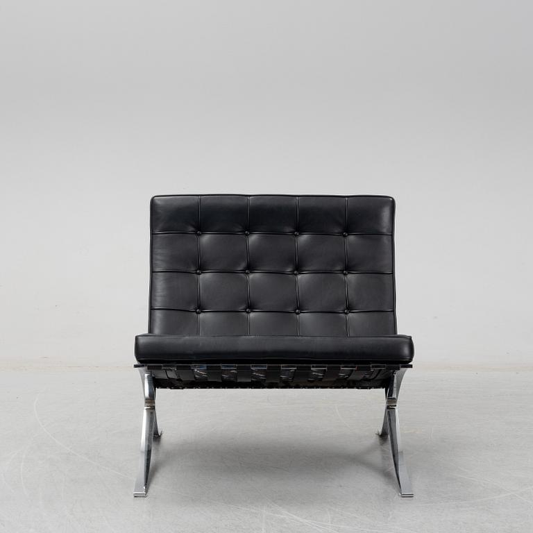 LUDWIG MIES VAN DER ROHE, a 'Barcelona' black leather lounge chair, Knoll Studio.