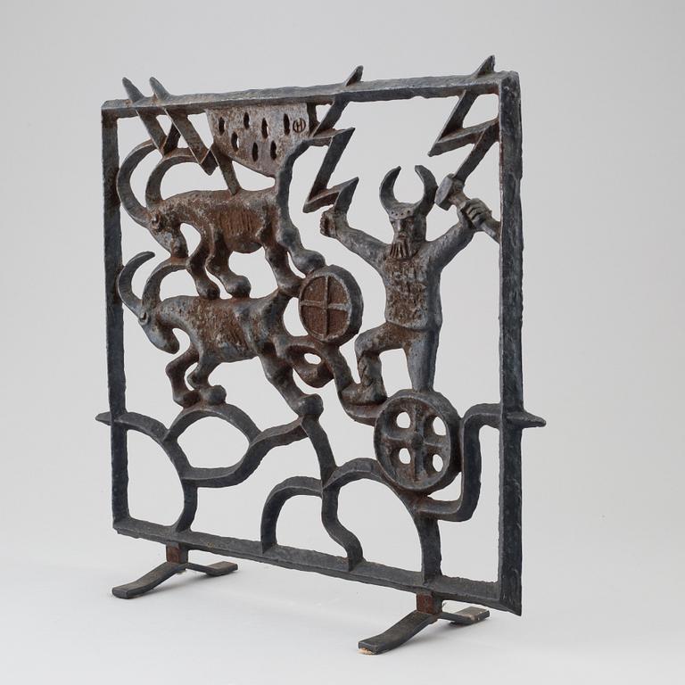 A cast iron fire guard by Olle Hermansson, Husqvarna.