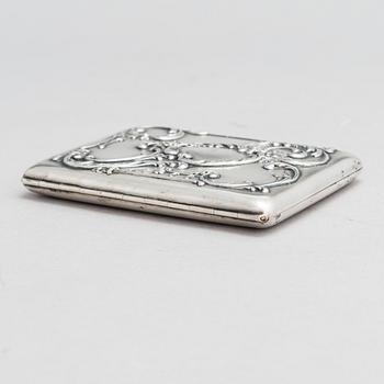 A Russian silver cigarette case, maker's mark of Mikhail Tarasov, Moscow 1908-14.