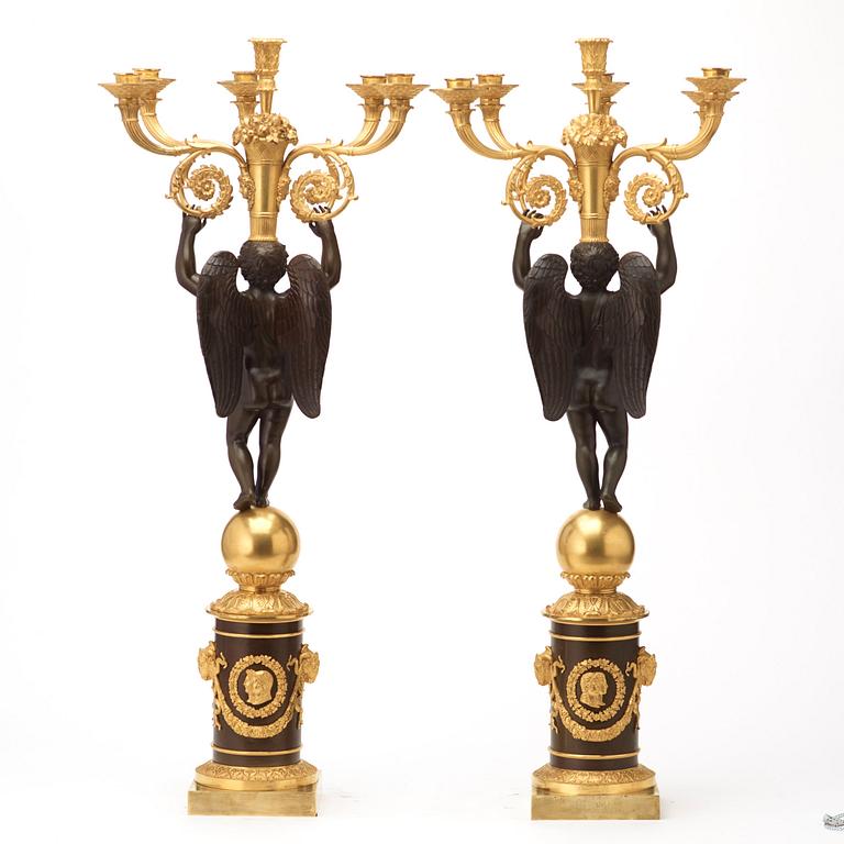 A large pair of French Chibout circa 1820 gilt and patinated bronze six-light candelabra.