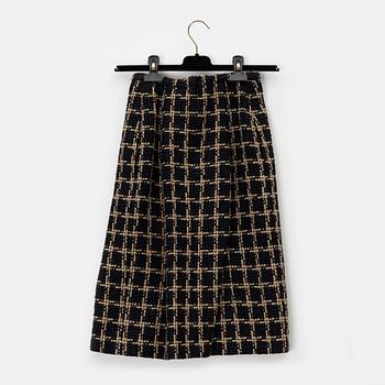 Chanel, a cotton tweed and silk skirt, size 34.