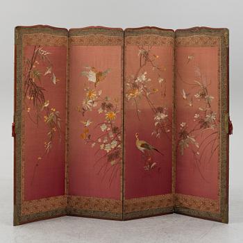 A Japanese embroidered four fold screen, 20th Century.