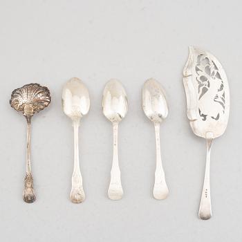 A Set of Silver Spoons and a Server, 18th-20th Century (5 pieces).