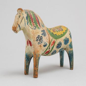 A Dala horse, painted pine, circa 1900.