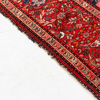A Farahan carpet, c. 520 x 205 cm.