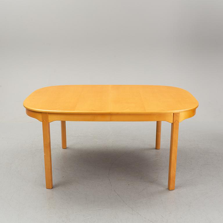 A Carl Malmsten 9-peice "Ambassaör" birch dining suite. Åfors Möbelfabrik.
