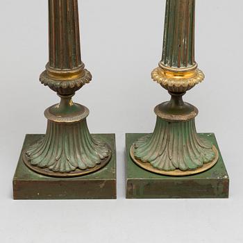 A pair of bronze gustavian candlesticks, late 18th century.