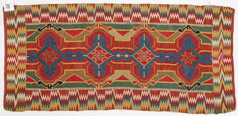 Sled cushion, Rölakan, southwestern Skåne, early 19th century, 115 x 55 cm.
