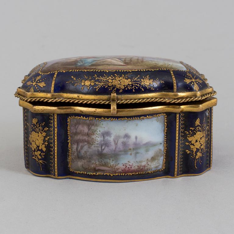 A circa 1900 porcelain box, Meissen style mark.