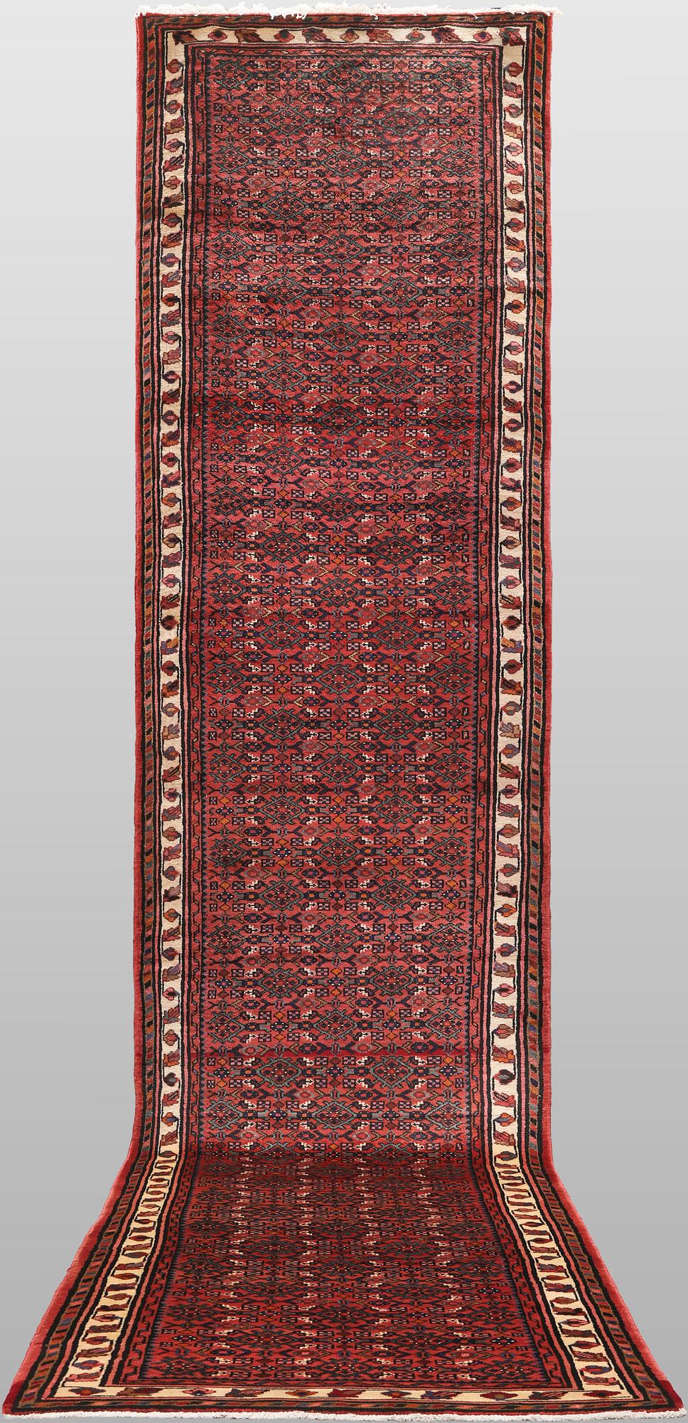 A Hosseinabad runner carpet, 508 x 105 cm.
