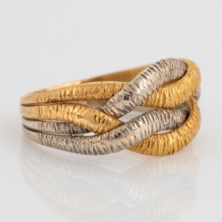 An 18K gold and white gold ring.