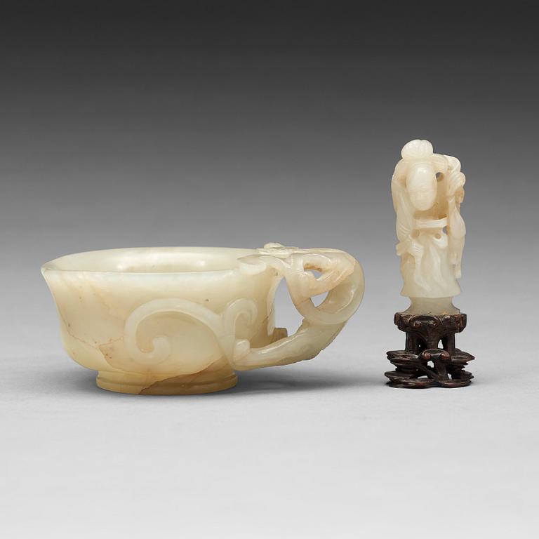 A nephrite cup and figurine, China, early 20th Century.