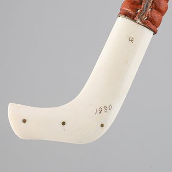 Valter Ranestål, a Sami reindeer horn knife, signed, and a Sami reindeer horn knife, not signed.