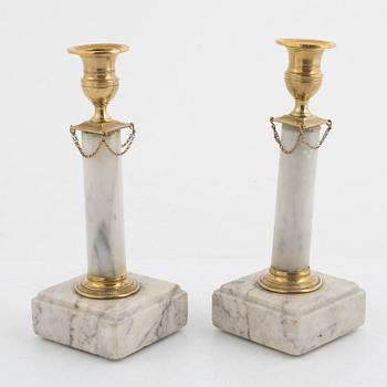 A pair of late Gustavian candlesticks, circa 1800.