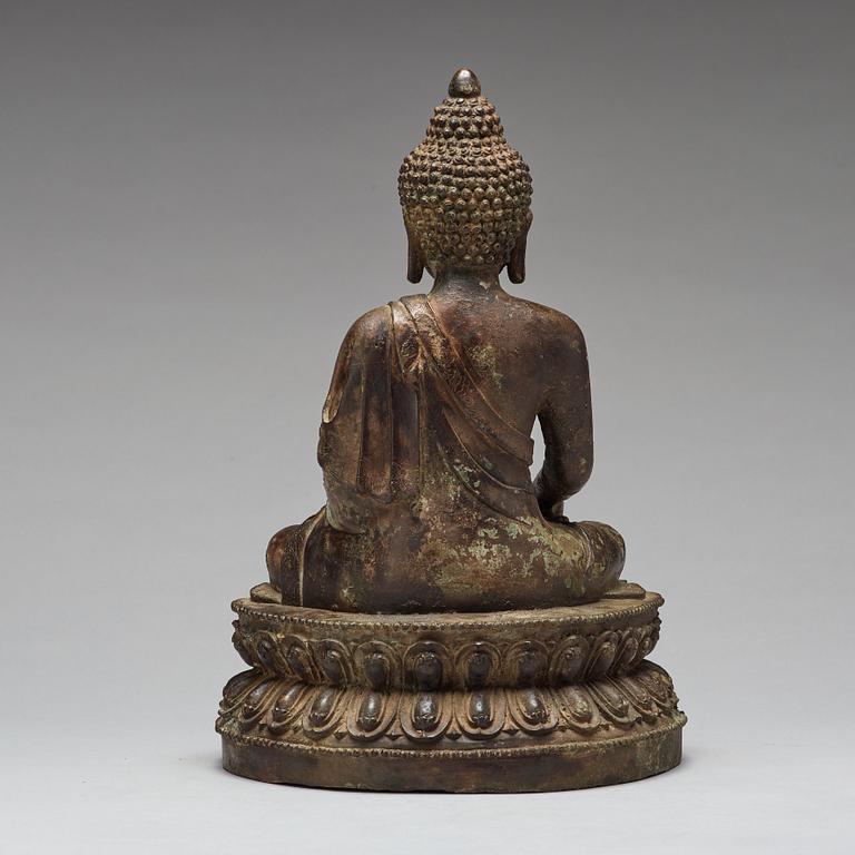 A bronze seated figure of Shakayamuni buddha, Mingtype.