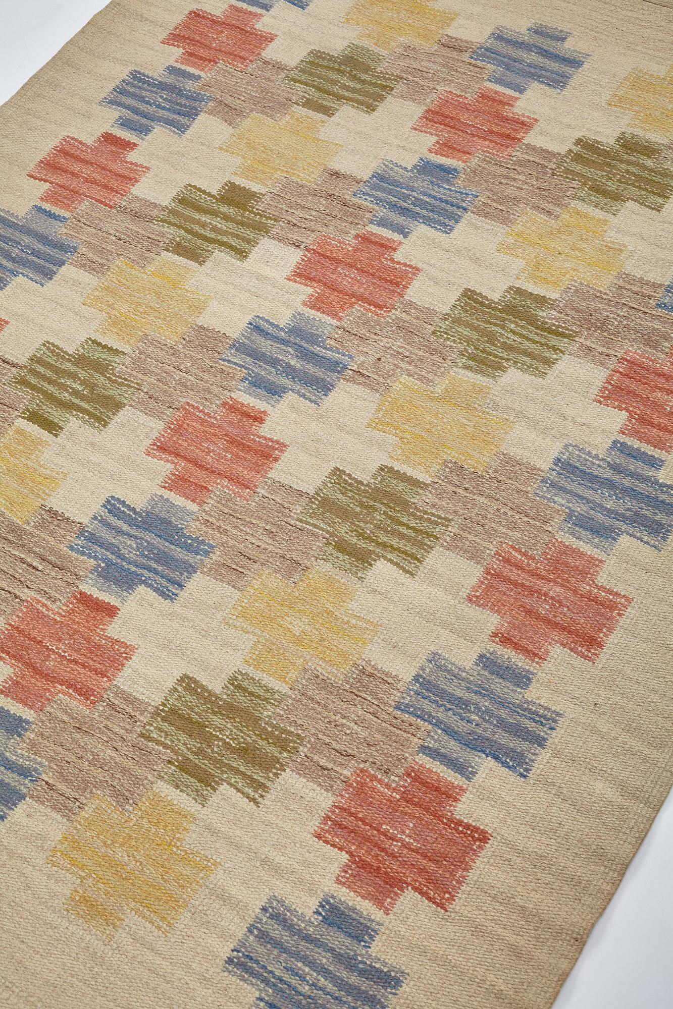 Swedish design, a carpet, knotted pile in relief, ca 178,5-179,5 x 137-140,5 cm, signed and dated at the back: SKLH 1944.