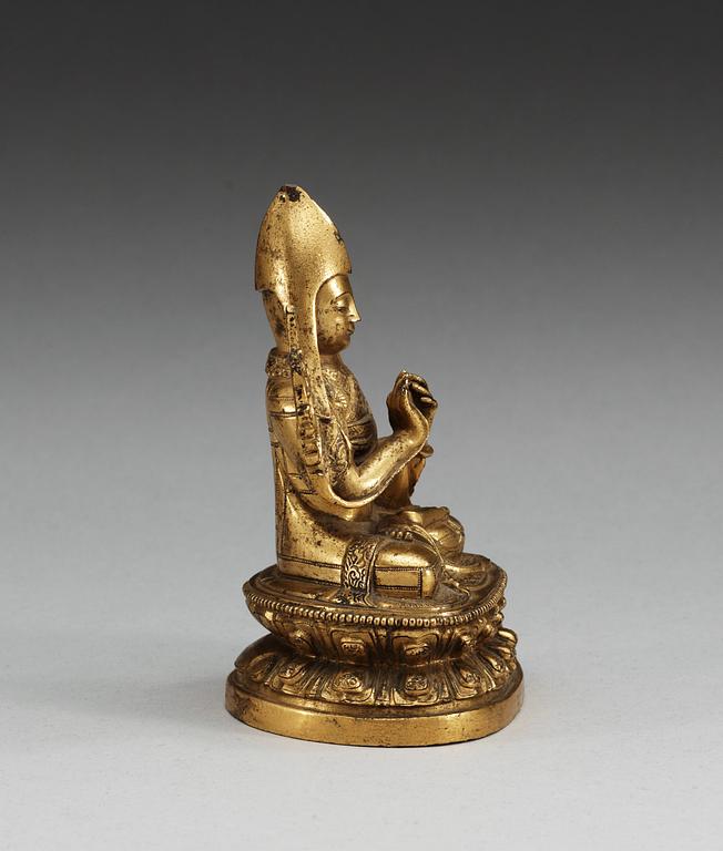 A gilt-bronze seated figure of a Lama, presumably Second Khalka Jetsun Dampa, Mongolia, presumably 18th Century.