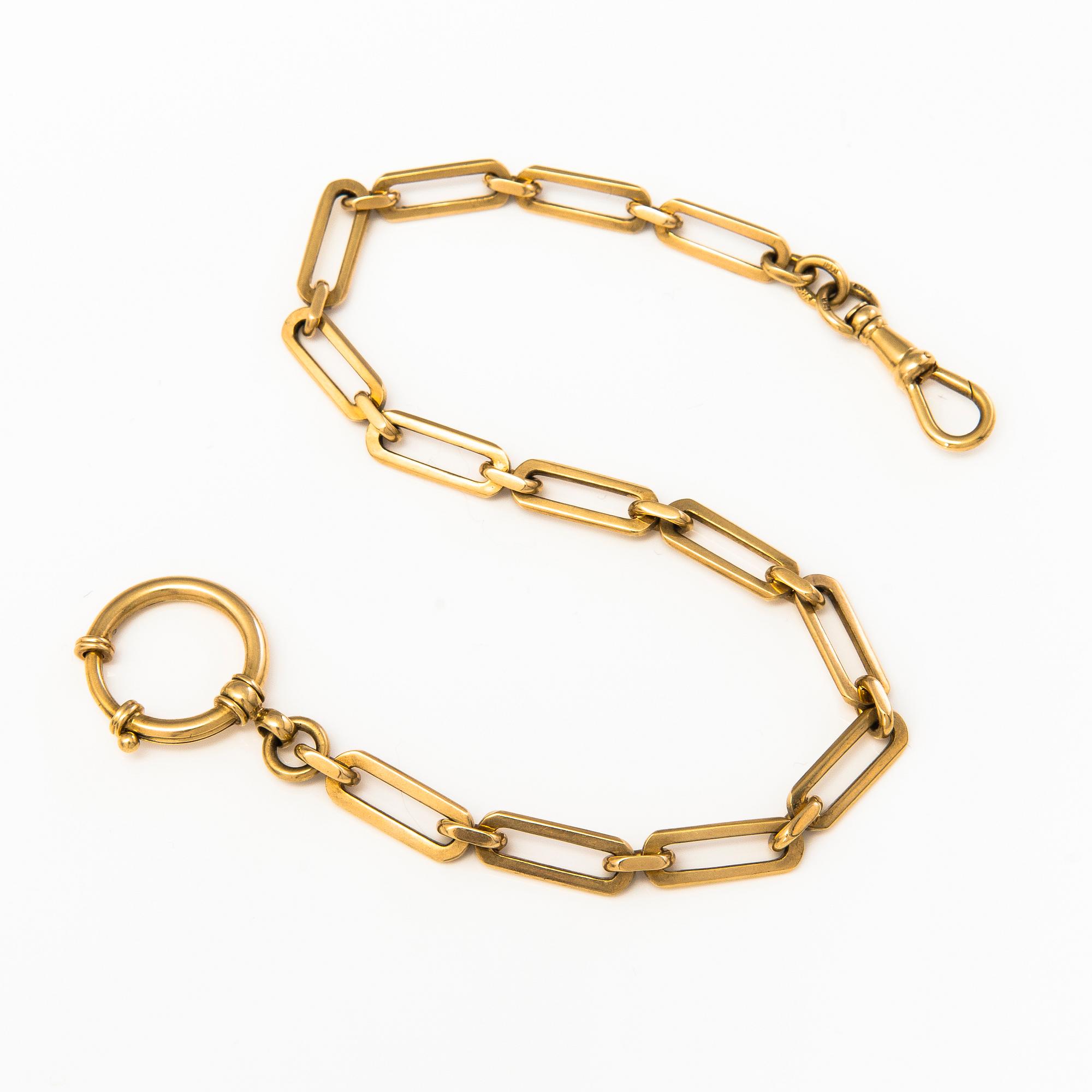 A 14K gold watch chain.