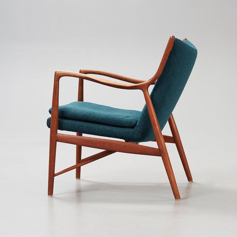 A Finn Juhl 'NV-45' teak easy chair, by cabinetmaker Niels Vodder, Denmark 1950's.