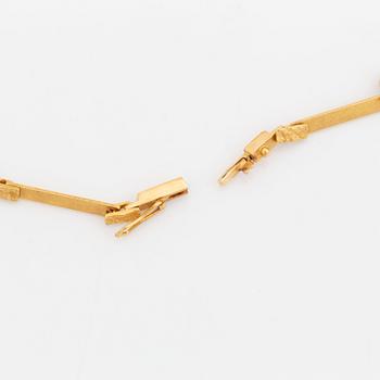 A Lapponia necklace design Björn Weckström in 18K gold set with spectrolite.