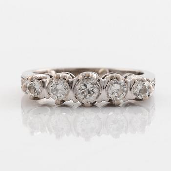 An 18K white gold ring set with round brilliant-and eight-cut diamonds.