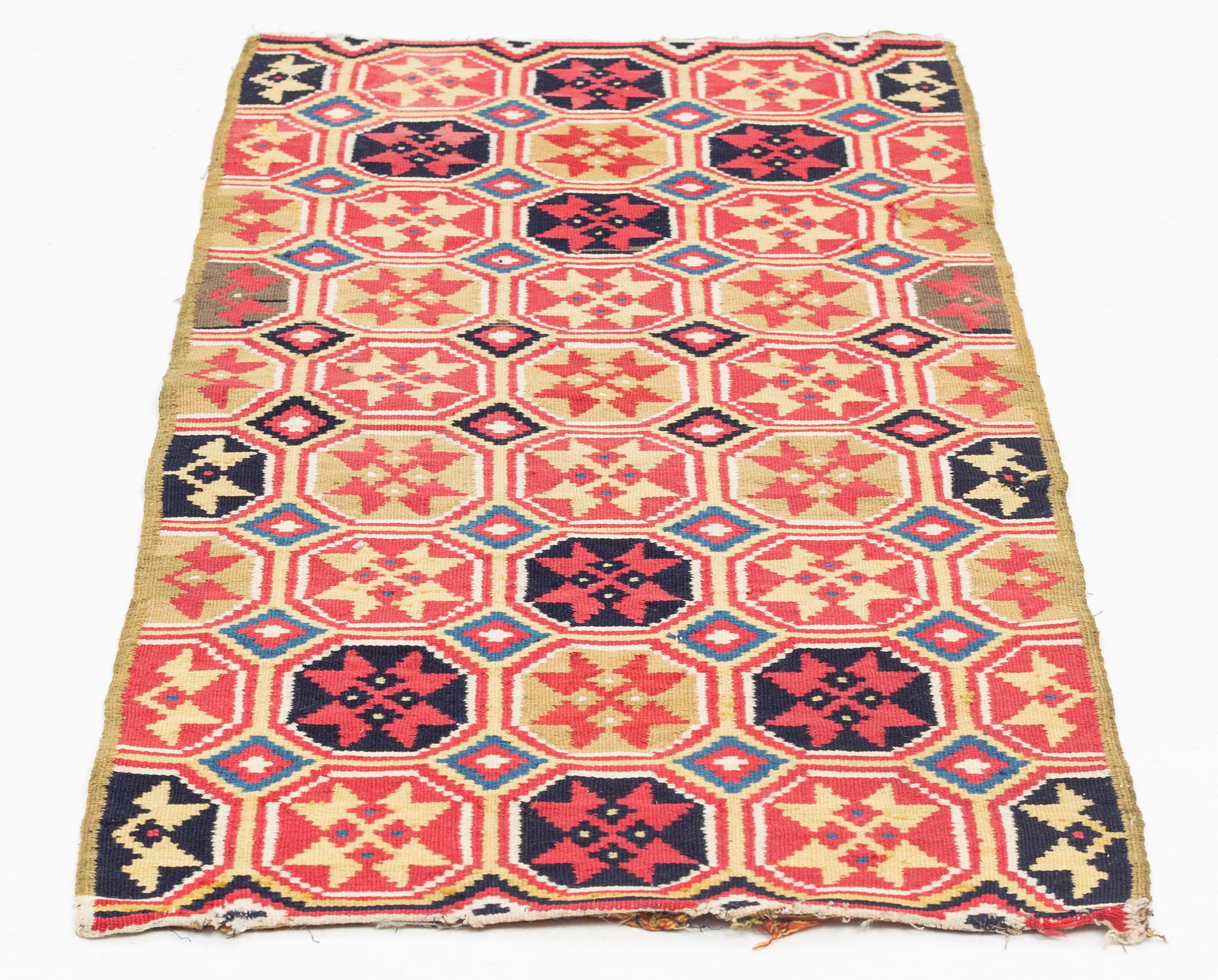 A carrige cushion,flat weave, ca 94,5 x 43 cm, Skåne, 1800-1830.
