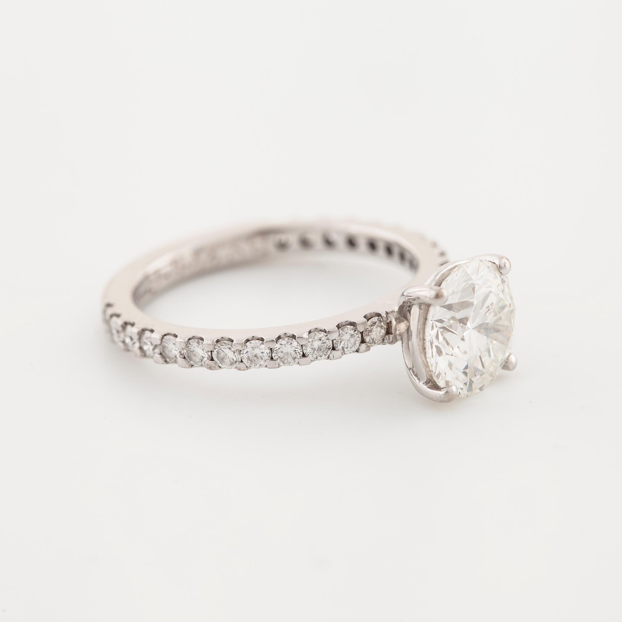 A brilliant cut diamond ring.