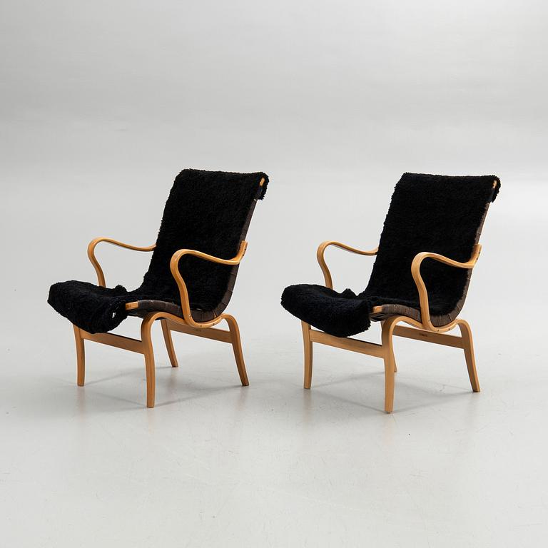 Bruno Mathsson, armchairs, a pair, "Eva", Bruno Mathsson International, Värnamo, second half of the 20th century.