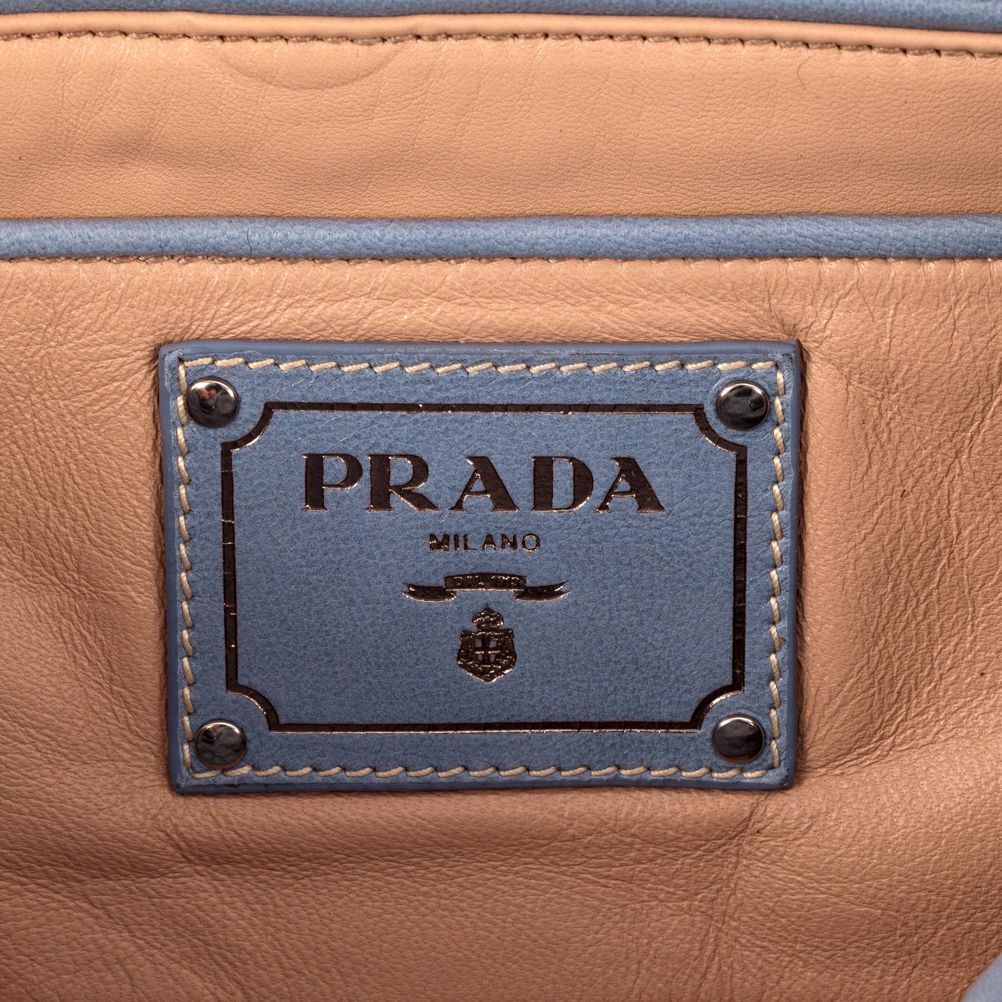 PRADA, a pale blue leather purse.