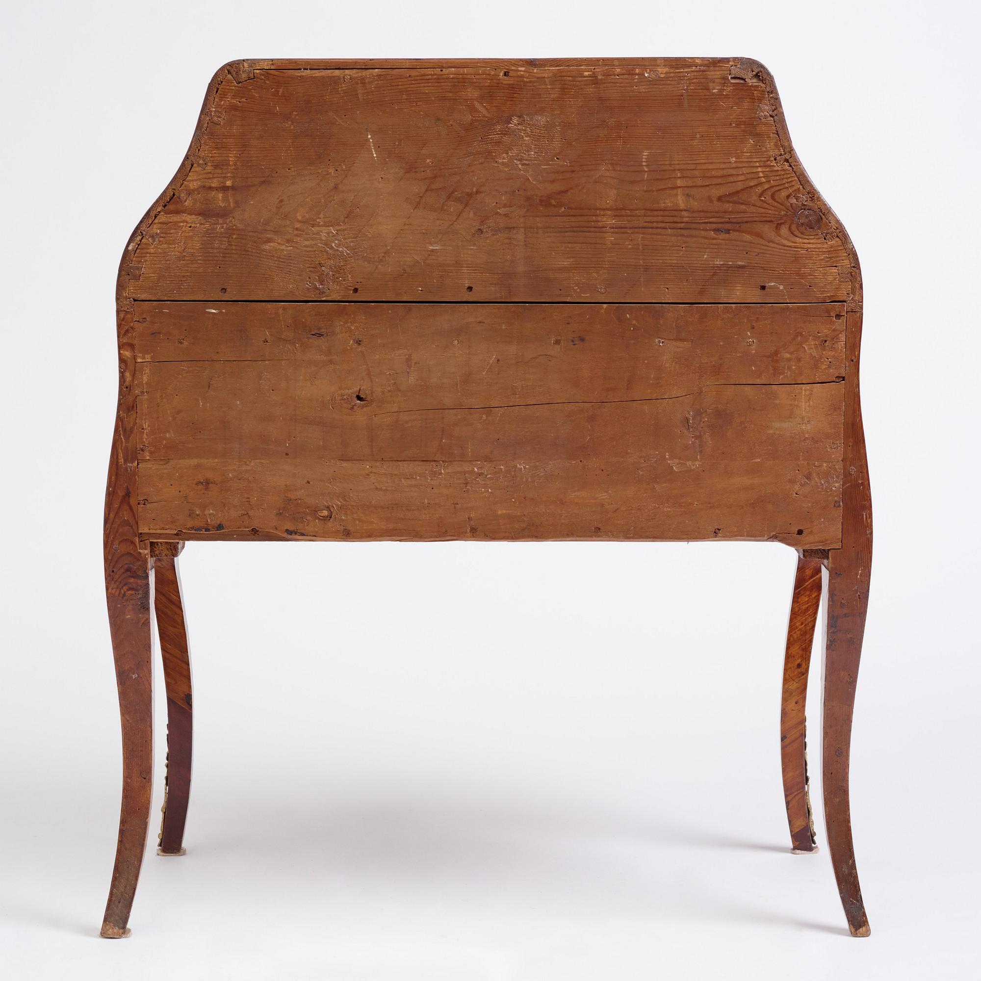 A rosewood, walnut, and gilt brass-mounted rococo secretaire by J. H. Reimers (master in Stockholm 1754-73).