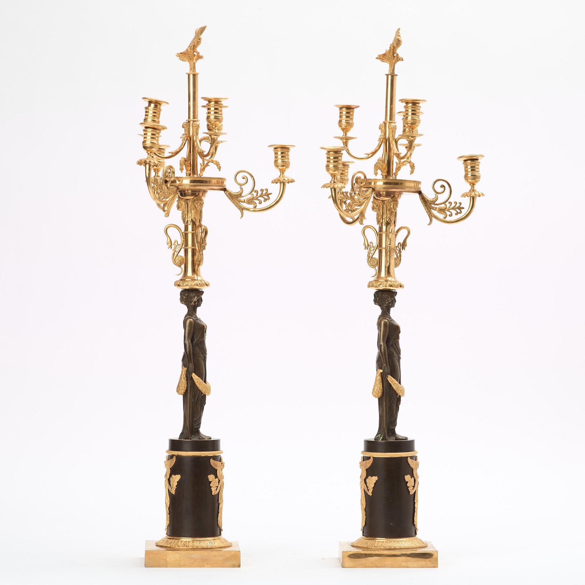 A pair of Empire early 19th century six-light candelabra.