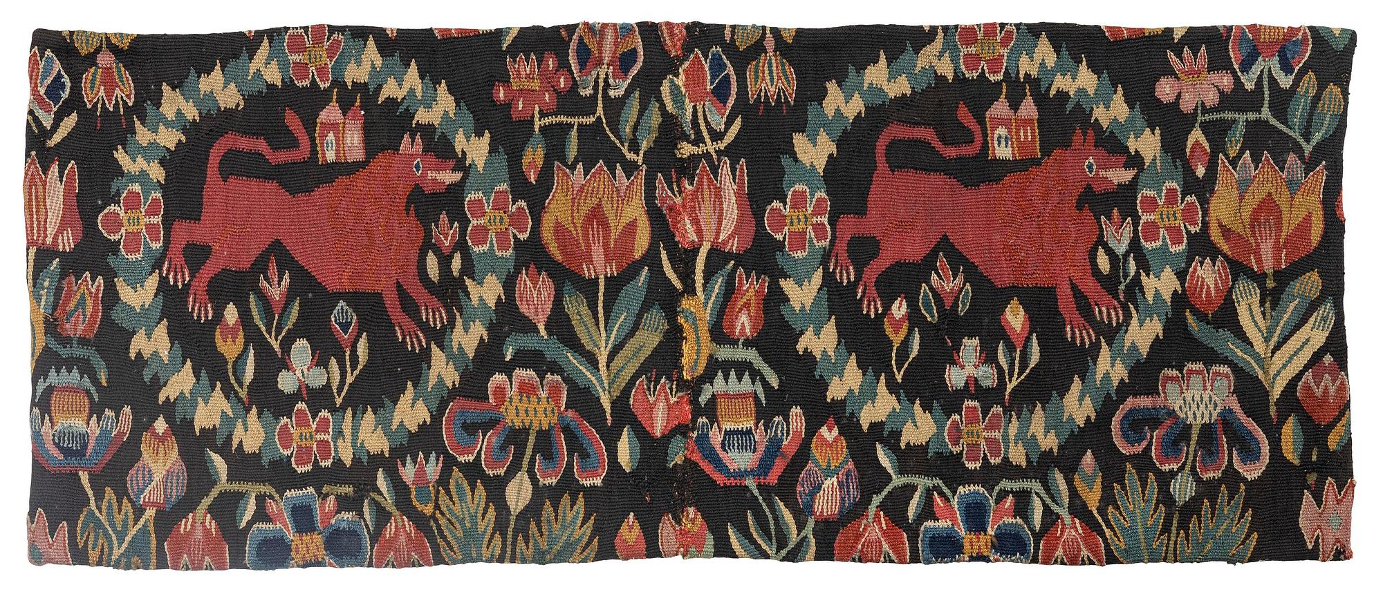 A cushion, 'Red Lion' (Rött Lejon), tapestry weave, ca 86 x 36 cm, southwestern Scania, first part of the 19th century.
