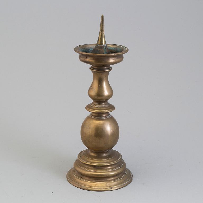 A BRONZE CANDLESTICK, probably 16th century.