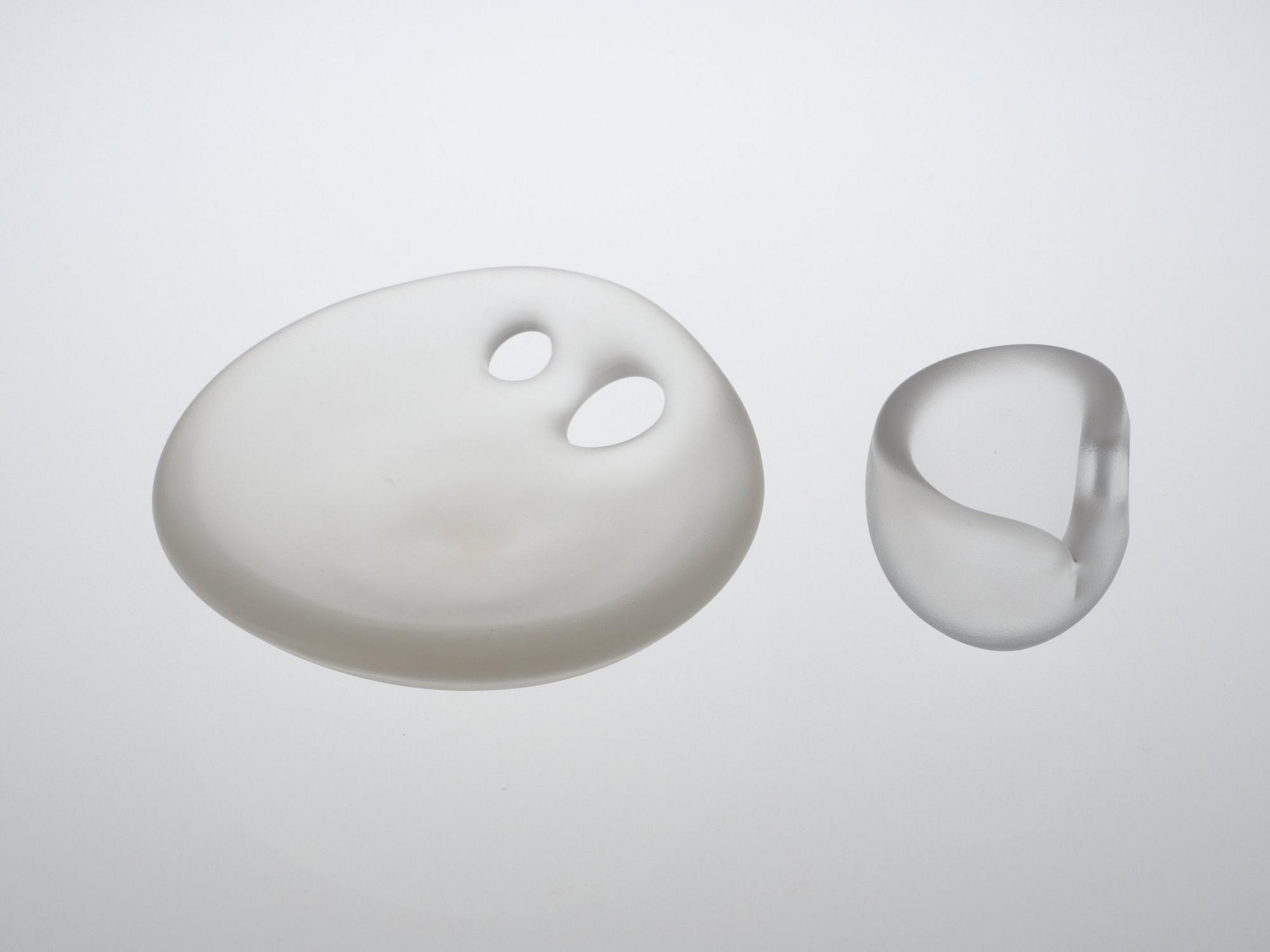 A set of two Timo Sarpaneva's Art objects, Devil's Cradle and Devil's Churn, Iittala, Finland.